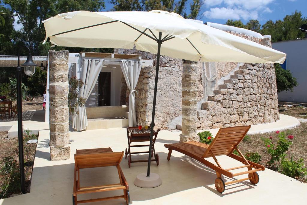 A patio or other outdoor area at Trullo Le Macchie