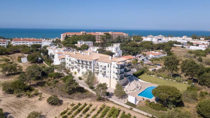 an aerial view of a resort with a swimming pool at Holiday Apartment Near The Sea in Galé