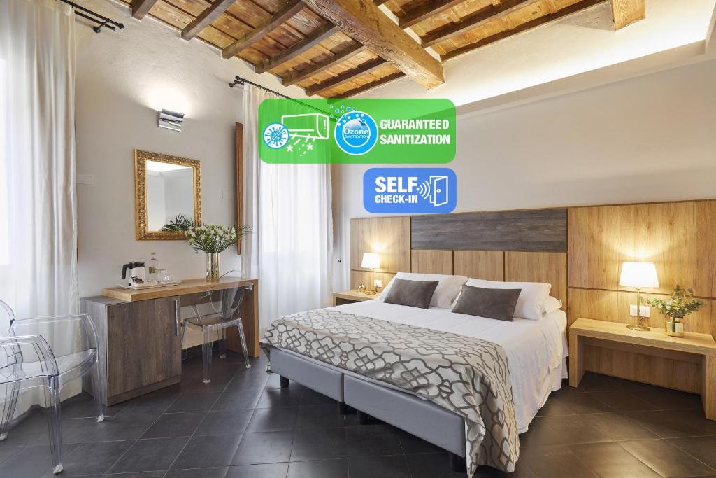 a hotel room with a bed and a street sign at Sette Angeli Rooms in Florence