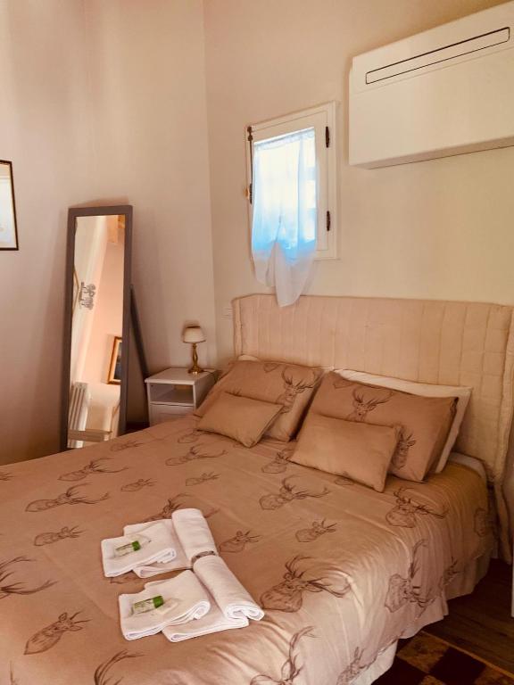 Postel nebo postele na pokoji v ubytování Il borghetto di Torno
