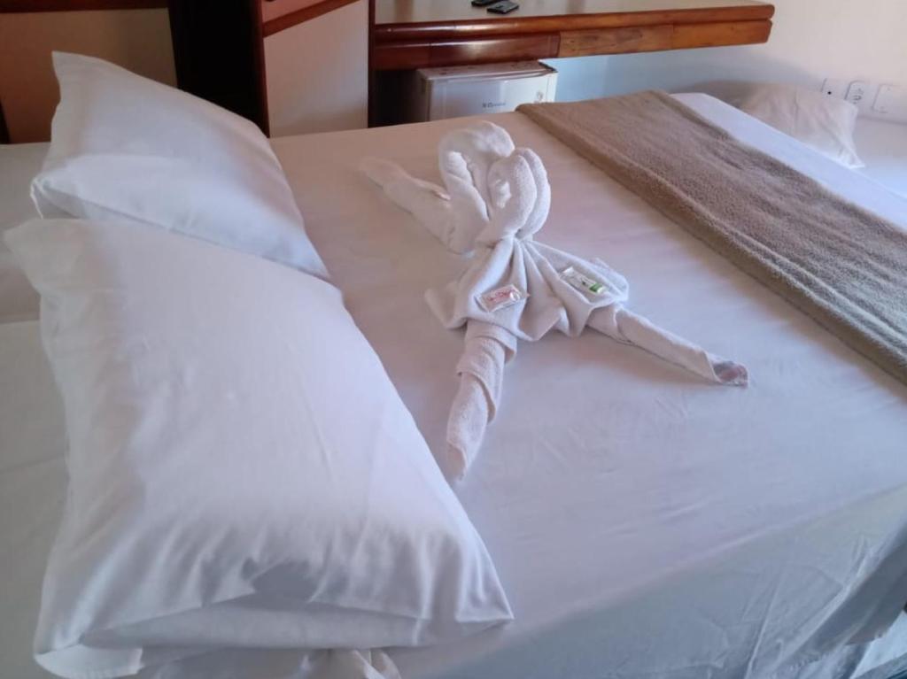 Postel nebo postele na pokoji v ubytování Pousada E Restaurante Doce Desejo
