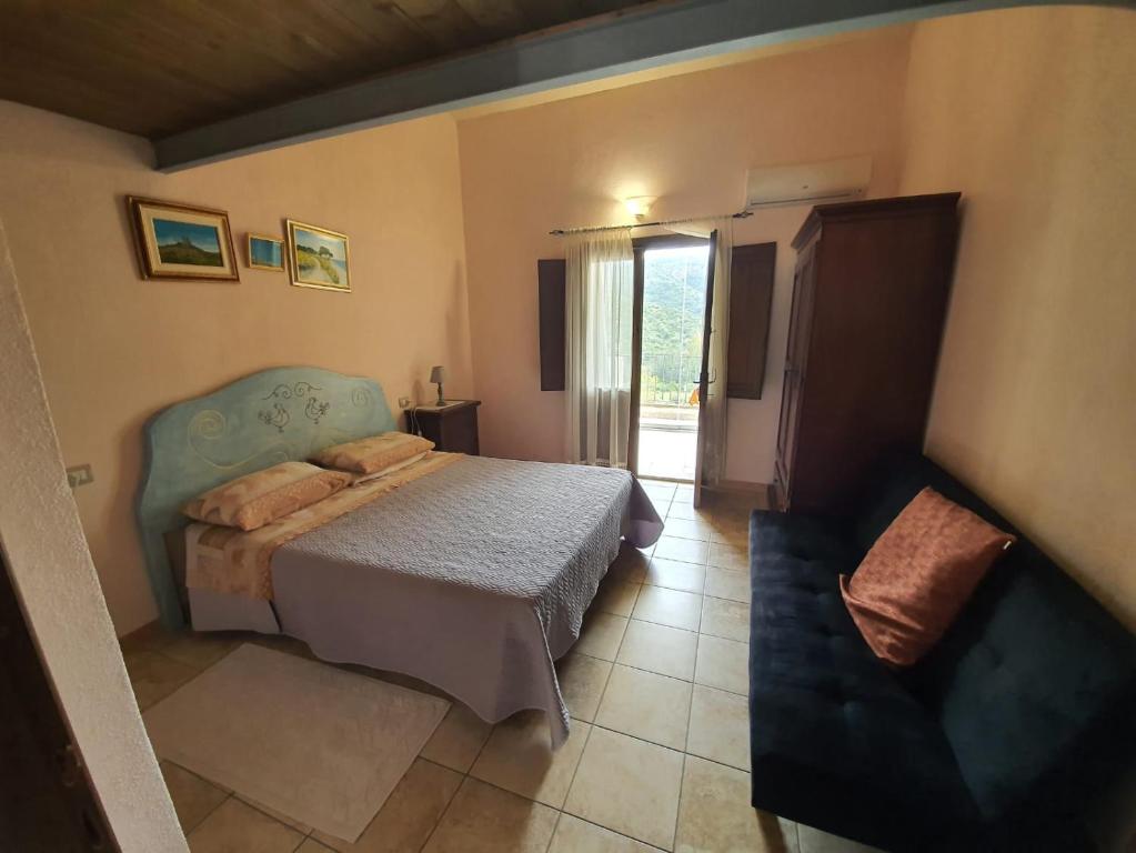 Postel nebo postele na pokoji v ubytování Hotel Valle del Cedrino