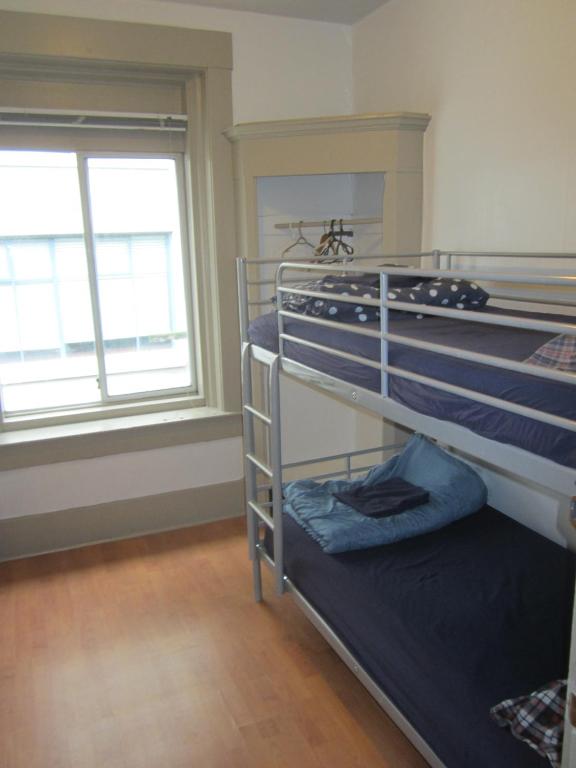 Cama o camas de una habitación en St Clair Hostel