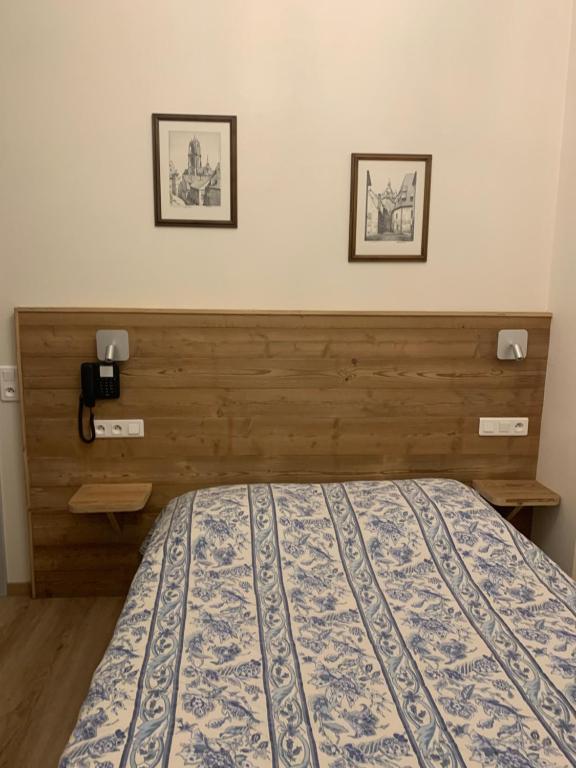 Postel nebo postele na pokoji v ubytování Hotel Restaurant Dontenville