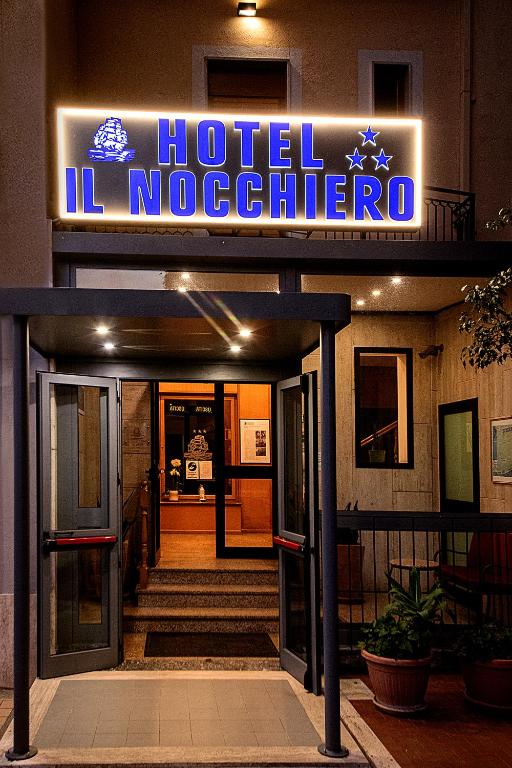 a hotel lobby with a sign that reads hotel no detector at Il Nocchiero City Hotel in Soverato Marina