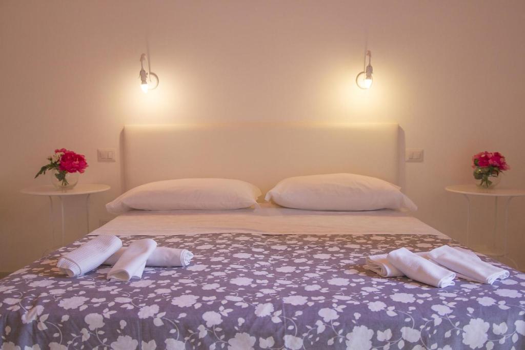 Postel nebo postele na pokoji v ubytování Il Borghetto Apartments & Rooms