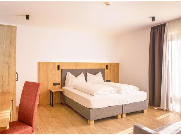 Postel nebo postele na pokoji v ubytování Garni B&B Chi Vai
