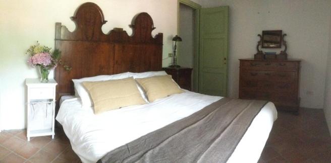 A bed or beds in a room at Apartment Casa Gianfrati