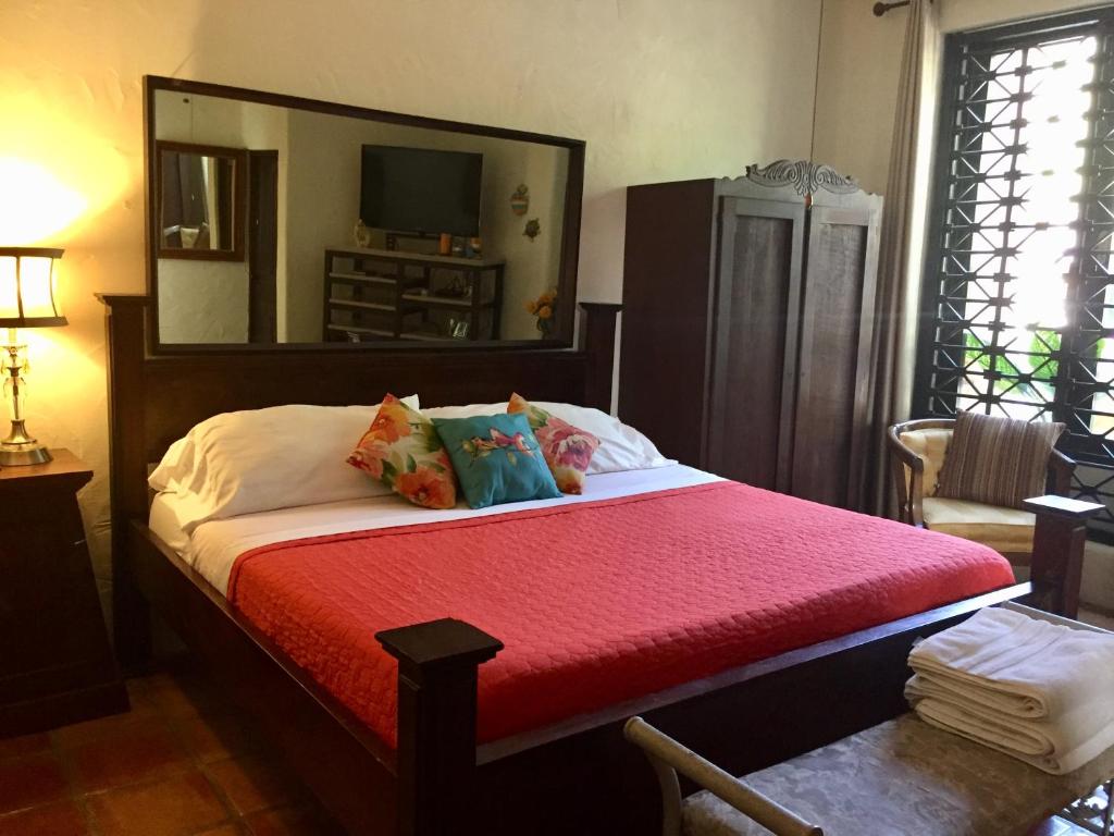 Postel nebo postele na pokoji v ubytování Villa Vassallo