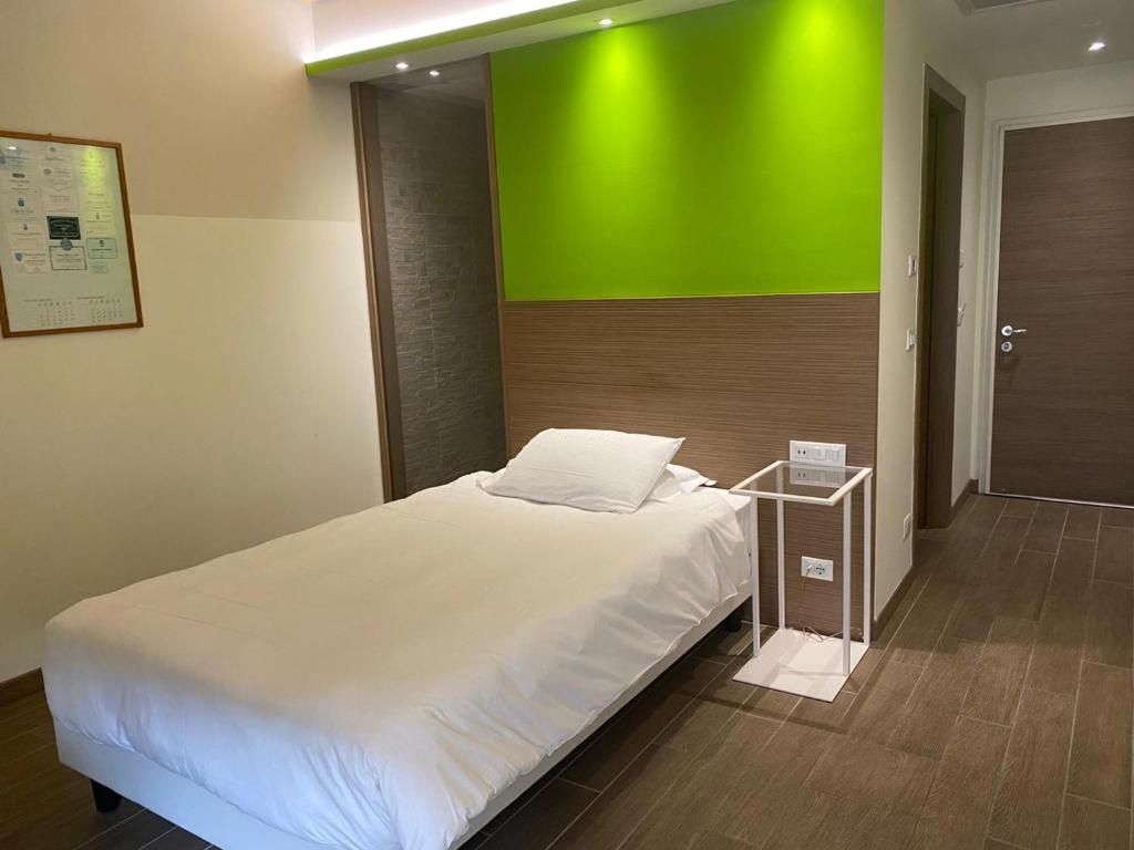 Postel nebo postele na pokoji v ubytování Hotel Marelet