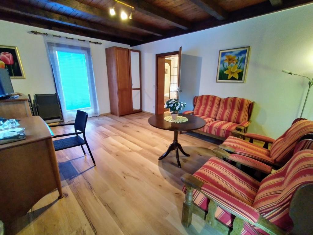 Posezení v ubytování Hotel Faller