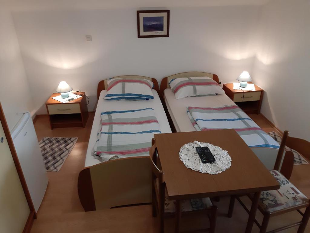 Postel nebo postele na pokoji v ubytování Turistična kmetija Široko