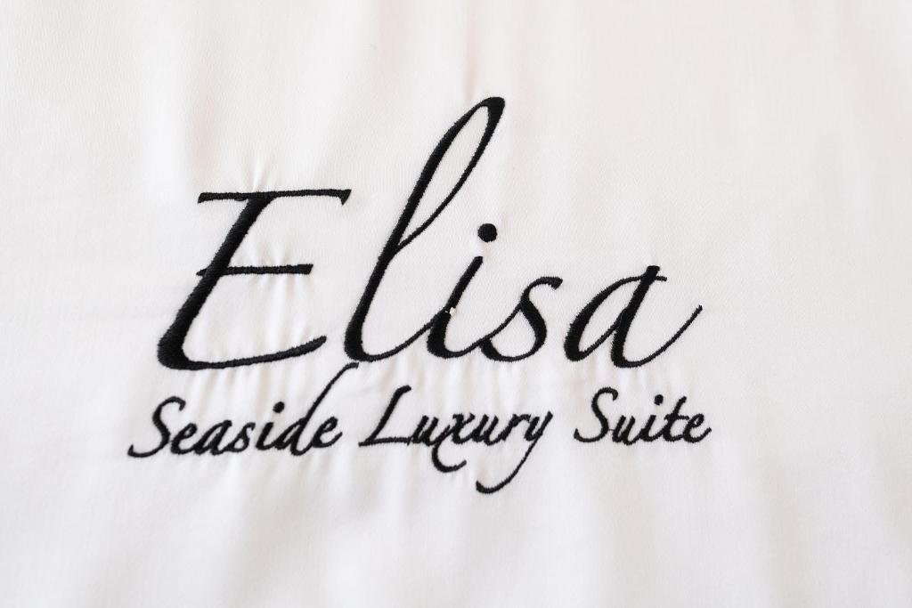 Certifikát, hodnocení, plakát nebo jiný dokument vystavený v ubytování Elisa Seaside Luxury Suite