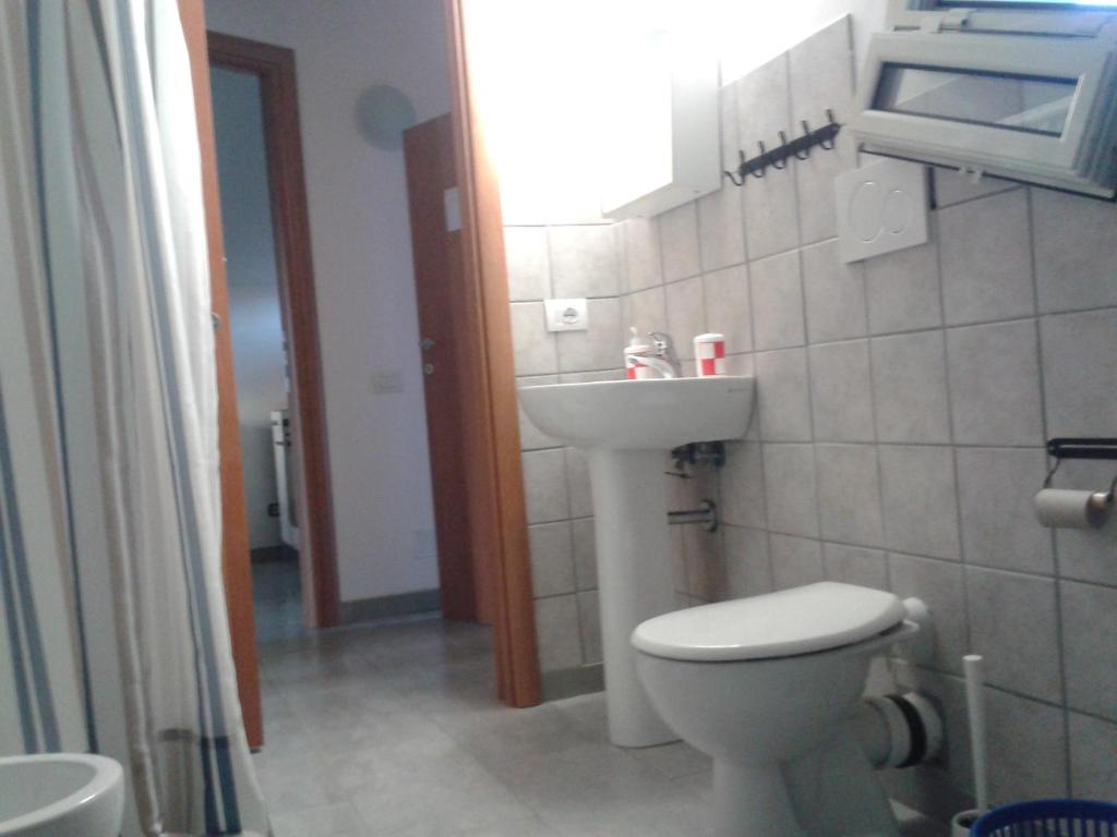 Koupelna v ubytování Appartamento Panoramico