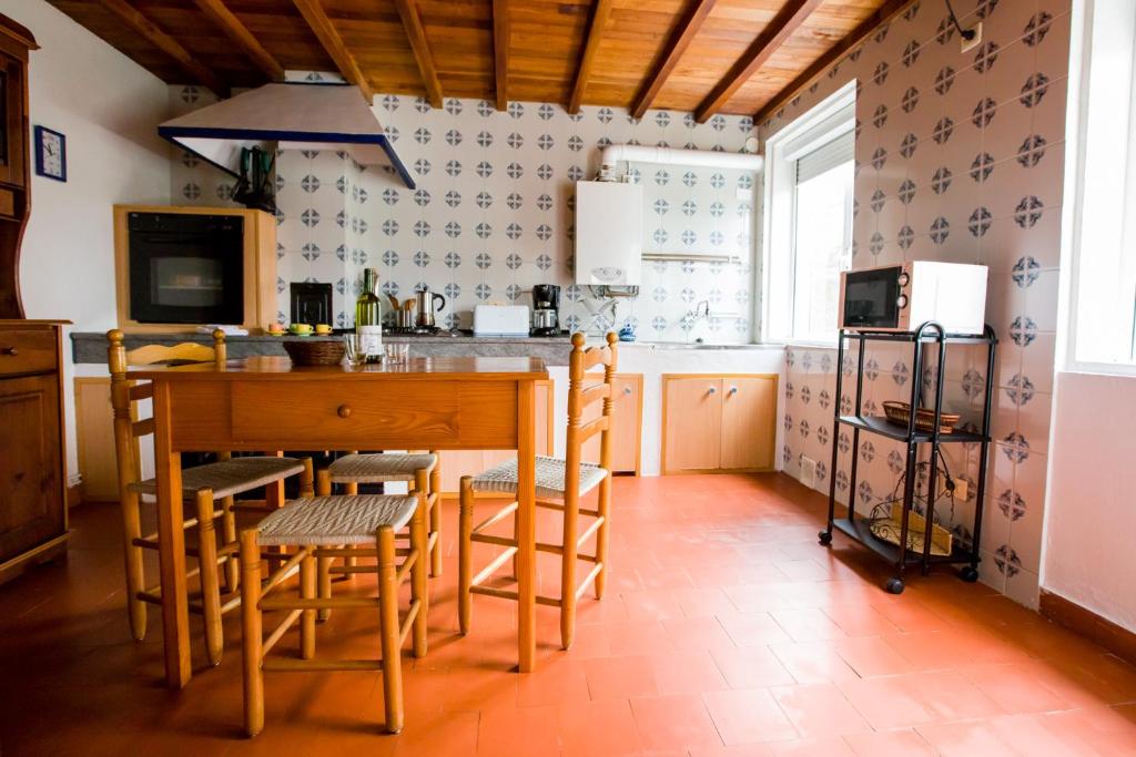 Kuchyň nebo kuchyňský kout v ubytování Casiña de Meyre
