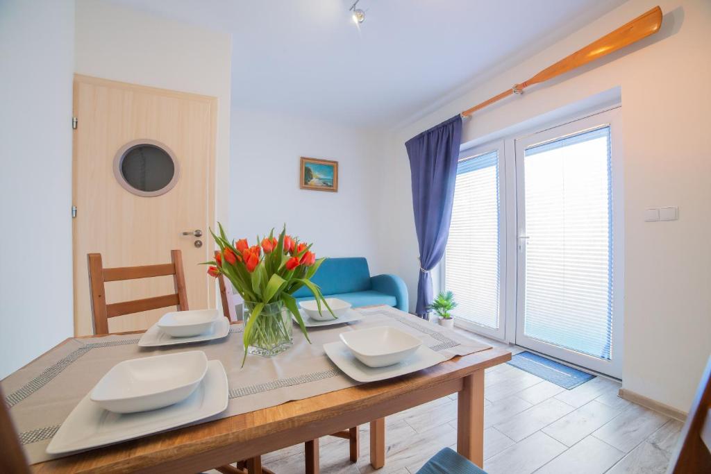 Posedenie v ubytovaní Rellim Apartamenty