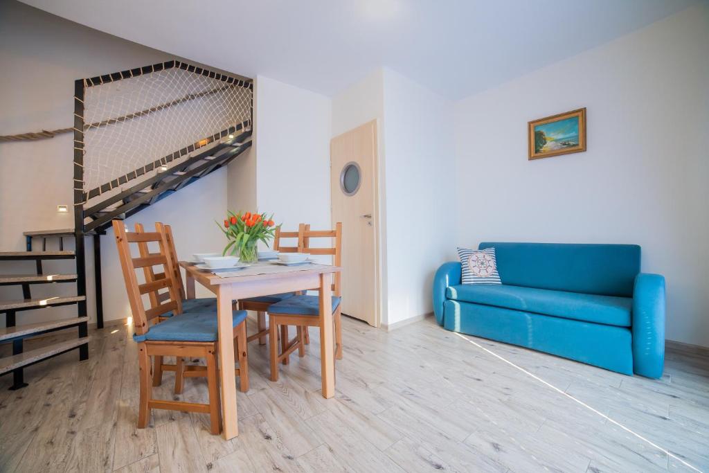Posedenie v ubytovaní Rellim Apartamenty