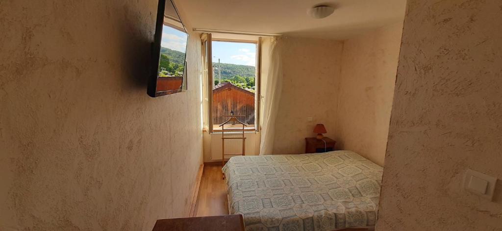 Postel nebo postele na pokoji v ubytování Le Marmagne