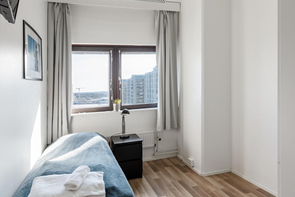 Postel nebo postele na pokoji v ubytování Sky Hostel Helsinki
