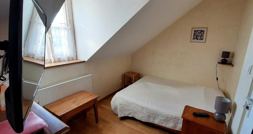 Postel nebo postele na pokoji v ubytování Le Marmagne