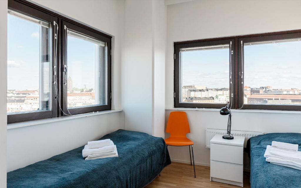 Postel nebo postele na pokoji v ubytování Sky Hostel Helsinki