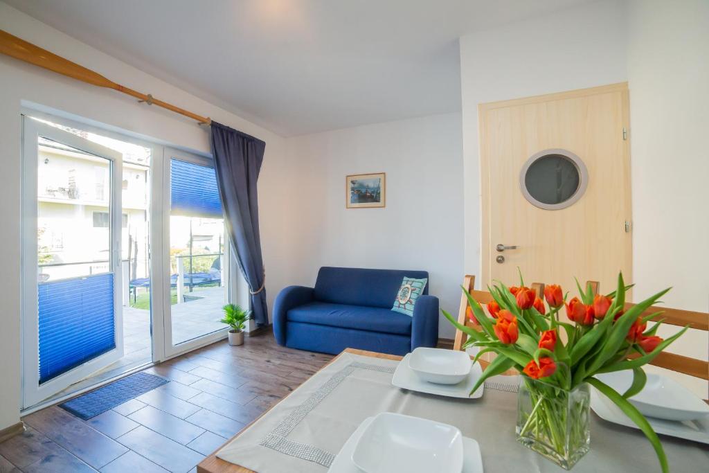 Posedenie v ubytovaní Rellim Apartamenty