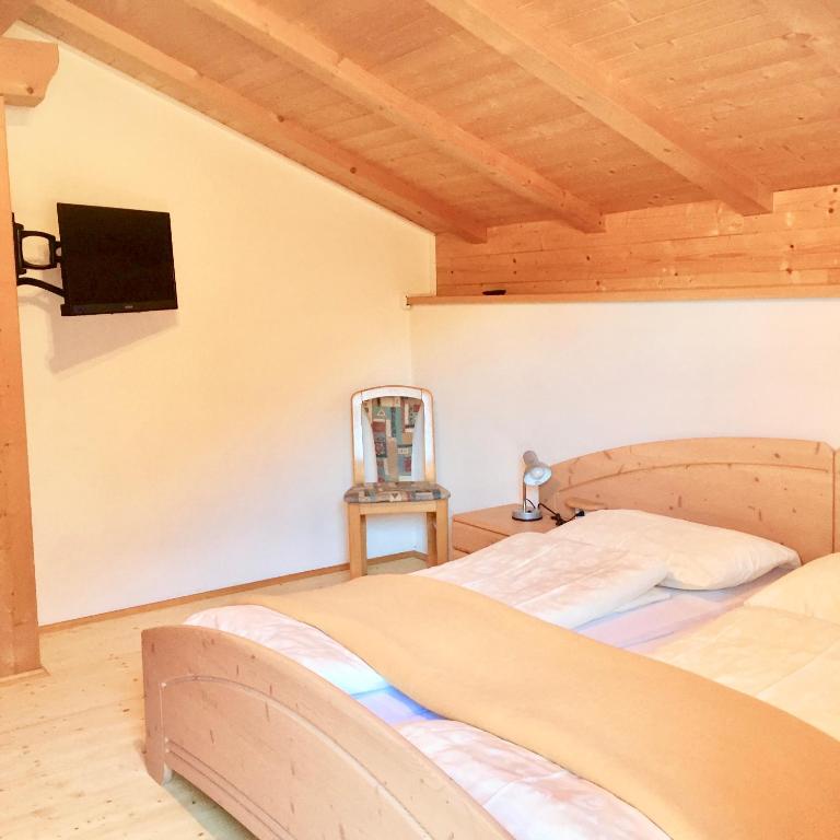Postel nebo postele na pokoji v ubytování Apartments Bernard