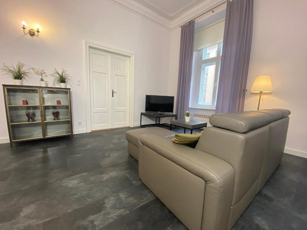 TV a/nebo společenská místnost v ubytování P&J Apartments Floriańska