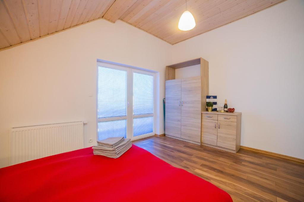 Posteľ alebo postele v izbe v ubytovaní Rellim Apartamenty