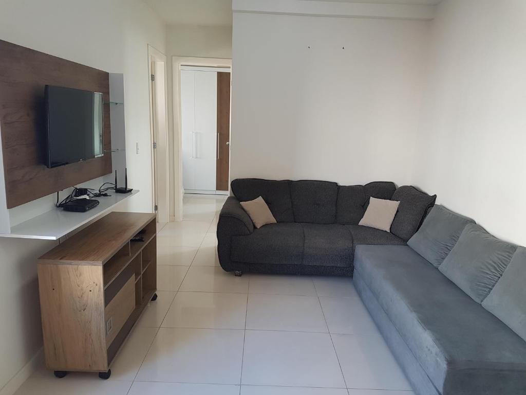 TV a/nebo společenská místnost v ubytování Apartamento Modus Vivendi