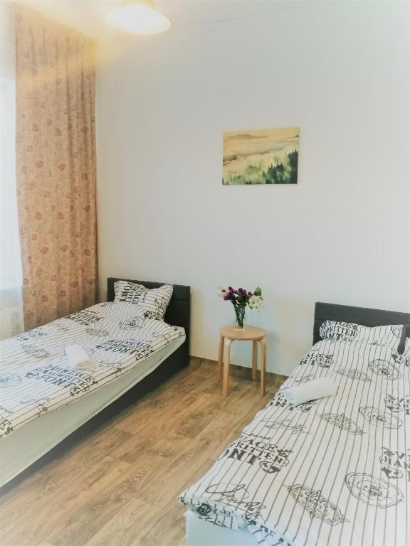 Posteľ alebo postele v izbe v ubytovaní ISLAND4U