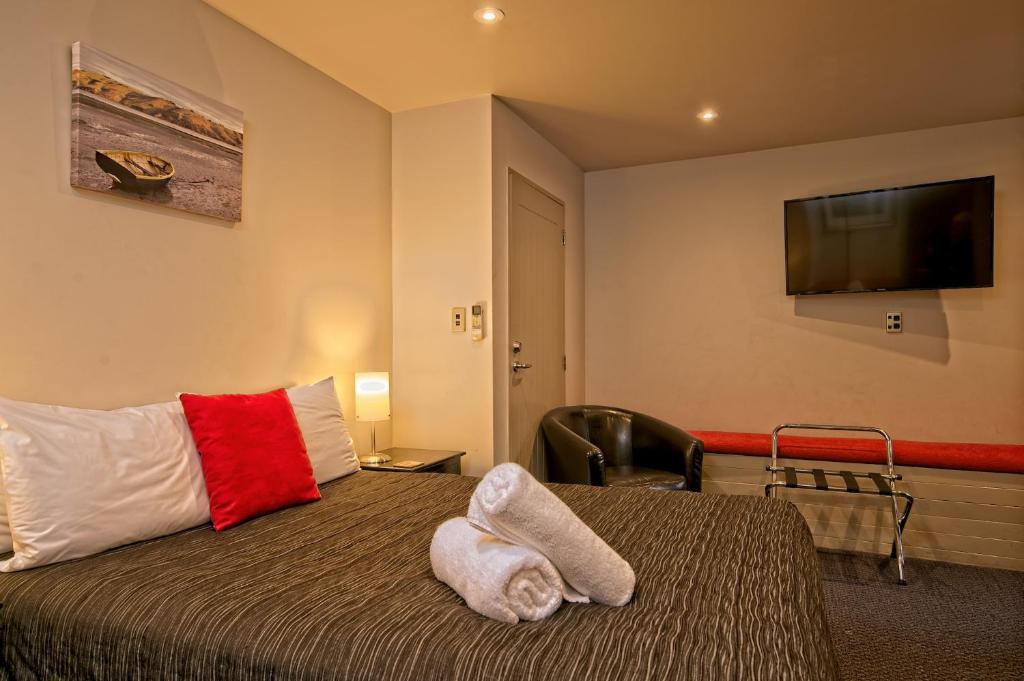 Voodi või voodid majutusasutuse Autoline Motel Queenstown toas