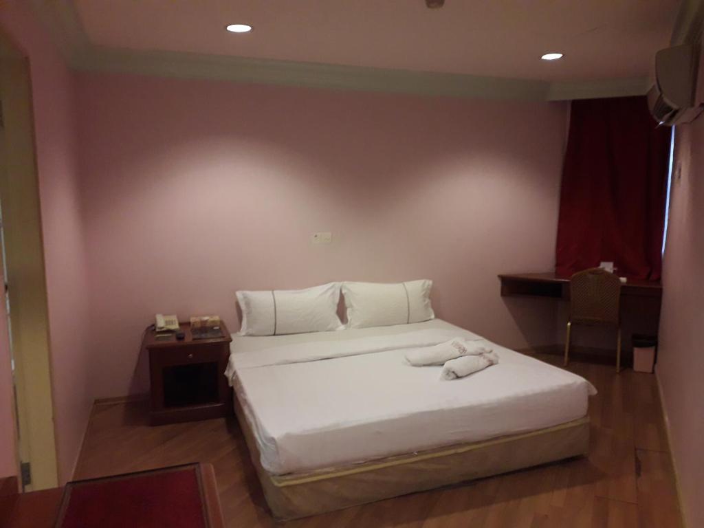 Postel nebo postele na pokoji v ubytování Hotel Deleeton