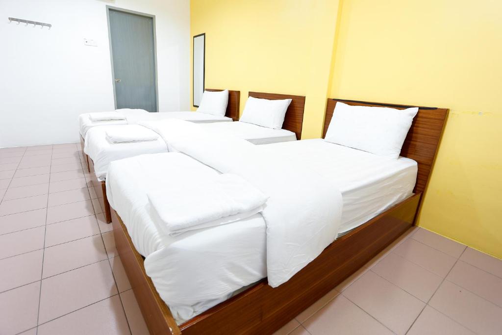 Postel nebo postele na pokoji v ubytování Lux Hotel
