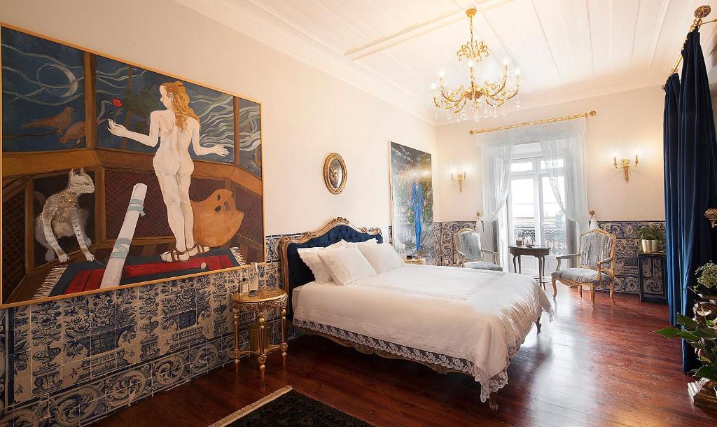 Postel nebo postele na pokoji v ubytování Casa dell'Arte Club House