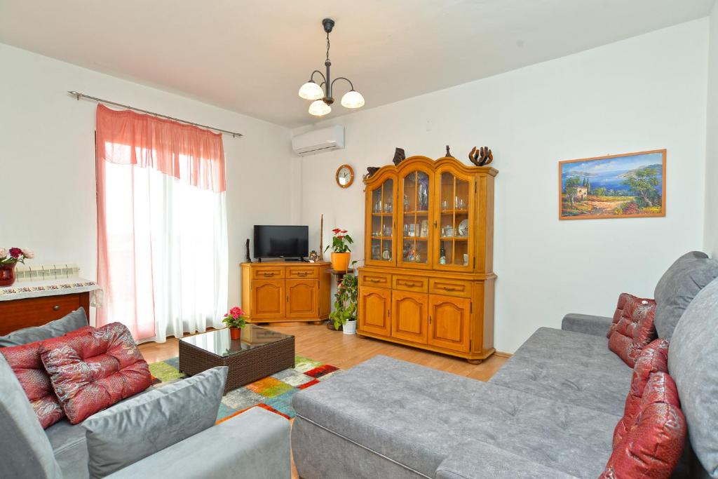 Televízia a/alebo spoločenská miestnosť v ubytovaní House Smiljana 2059