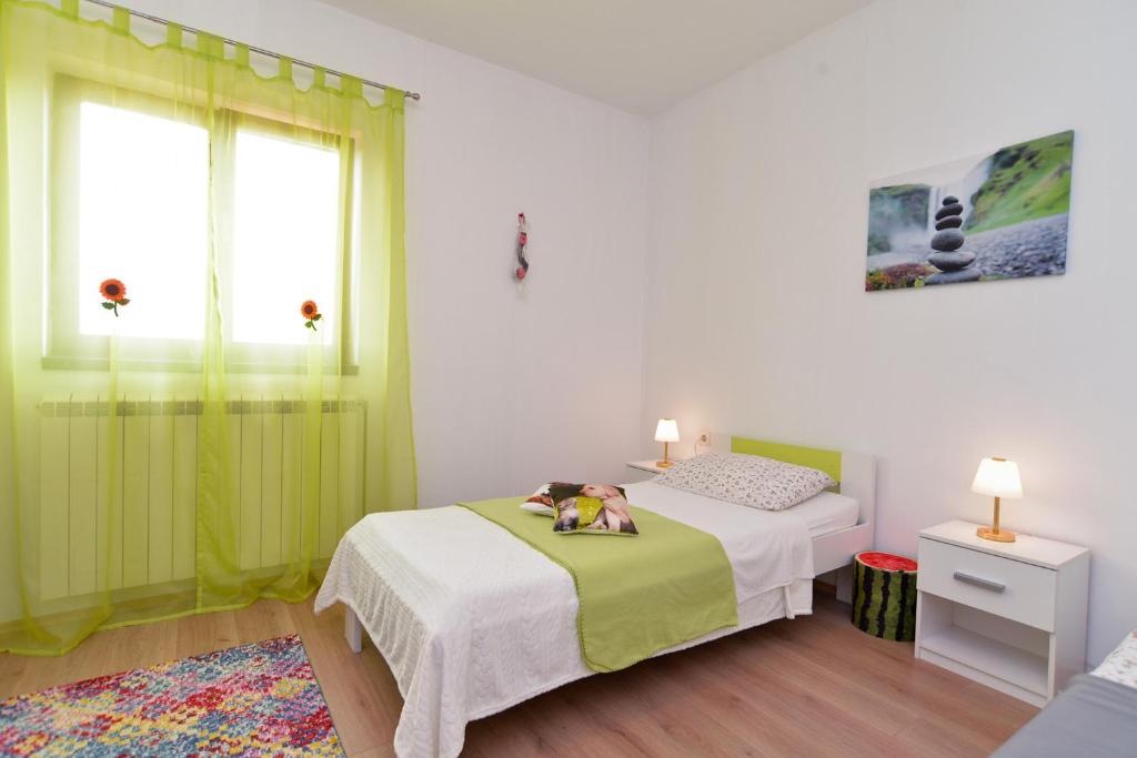 Posteľ alebo postele v izbe v ubytovaní House Smiljana 2059