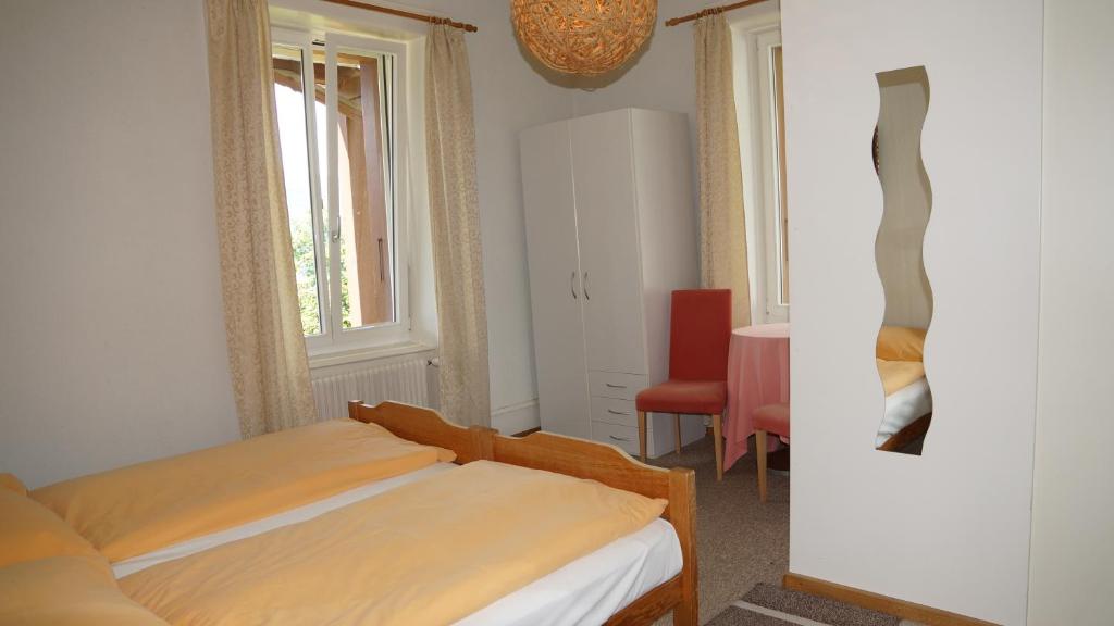 Postel nebo postele na pokoji v ubytování Hotel Beatus