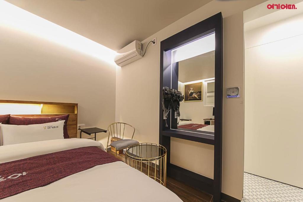 Postel nebo postele na pokoji v ubytování Hotel Yeogijoa