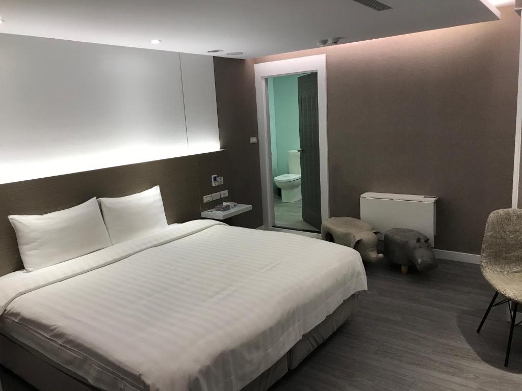 Golden Garden Hotelにあるベッド