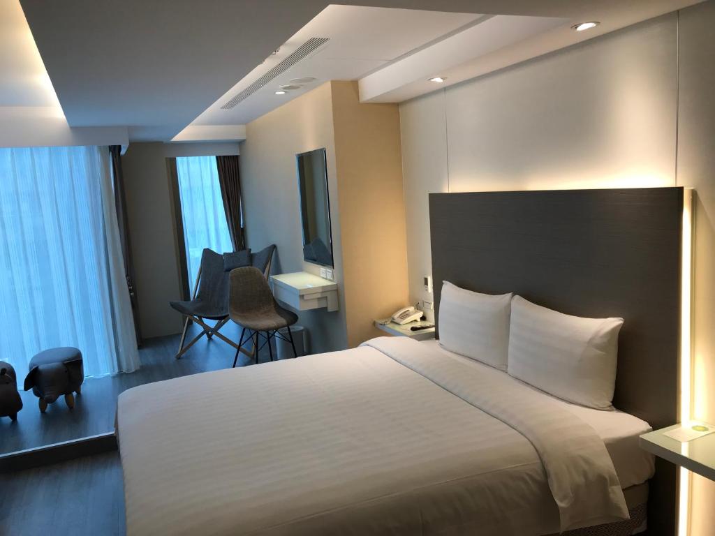 Golden Garden Hotelにあるベッド