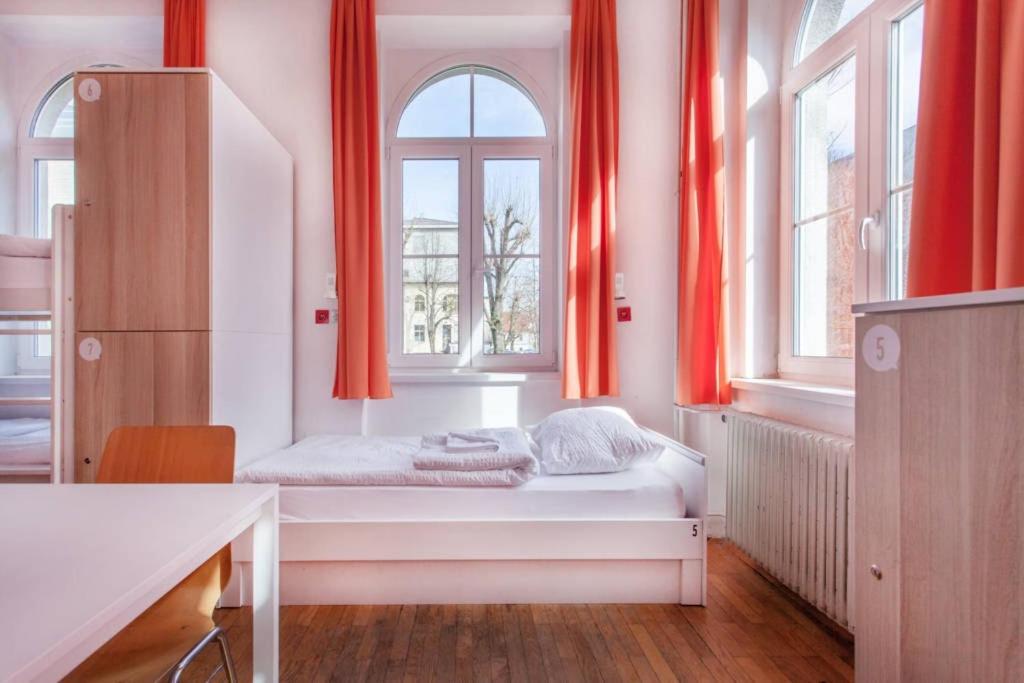 Postel nebo postele na pokoji v ubytování Hostel DIC