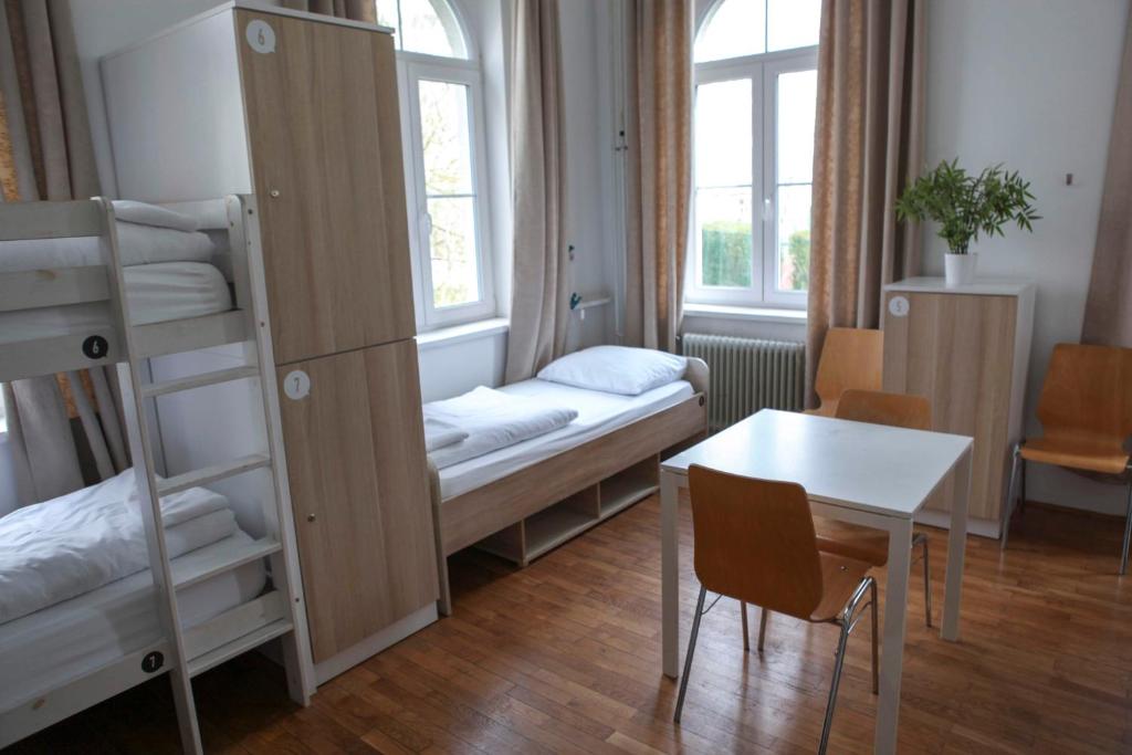 Postel nebo postele na pokoji v ubytování Hostel DIC