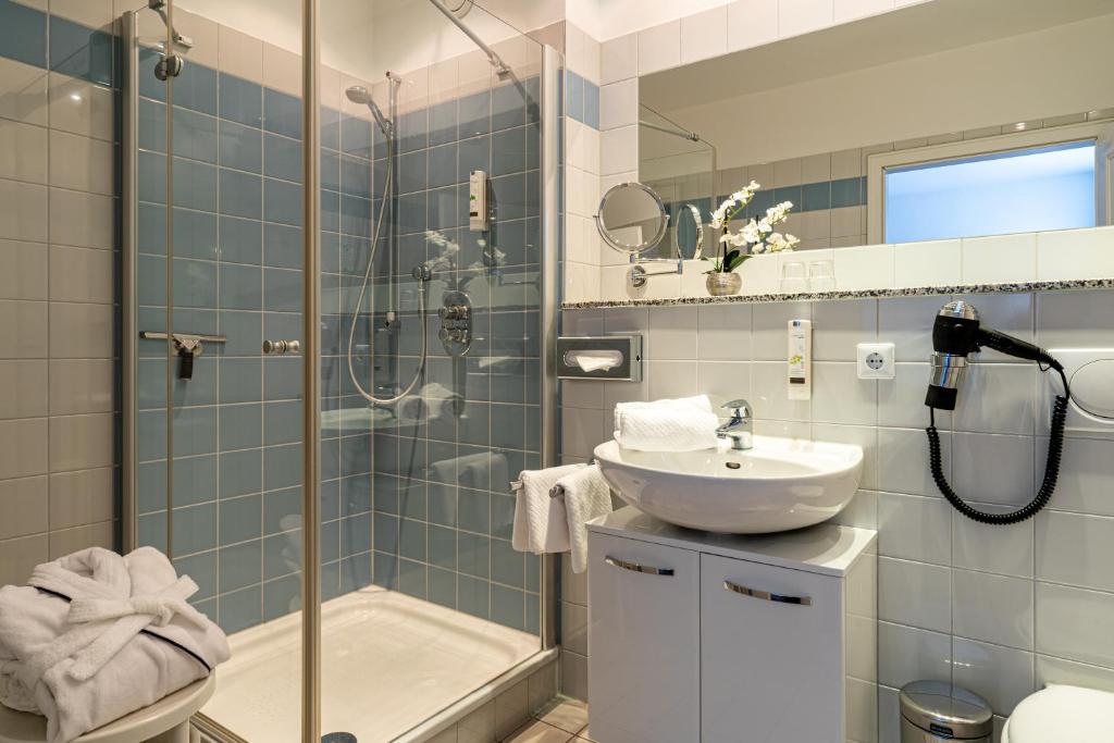 Koupelna v ubytování Hotel Villa Halliger