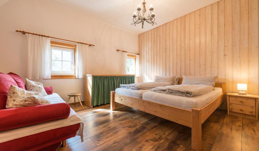 Postel nebo postele na pokoji v ubytování Das Haus am Grundlsee