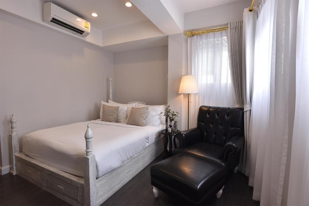 Giường trong phòng chung tại Noursabah Boutique Bed Bangkok