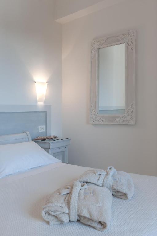 Postel nebo postele na pokoji v ubytování President Hotel