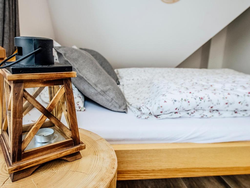 Posteľ alebo postele v izbe v ubytovaní Góralski Przystanek dom dla max 17 osób z sauną i balią z funkcją jacuzzi
