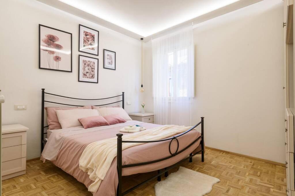 Postel nebo postele na pokoji v ubytování Casa Agata, accogliente appartamento nel centro storico