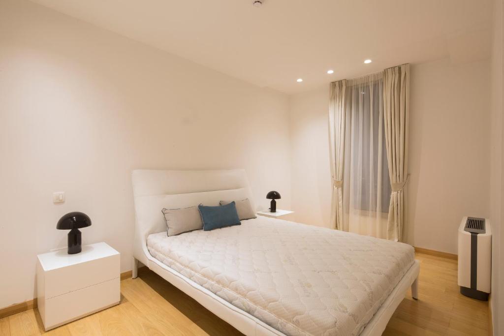 Postel nebo postele na pokoji v ubytování Hotel WOW